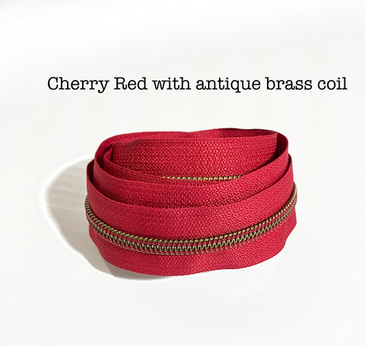 ANTIQUE BRASS COIL - CHERRY RED - #5 Metallic Nylon Coil Zipper tape
