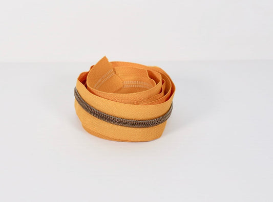 ANTIQUE BRASS COIL (SHINY) - MUSTARD - #5 Metallic Nylon Coil Zipper tape