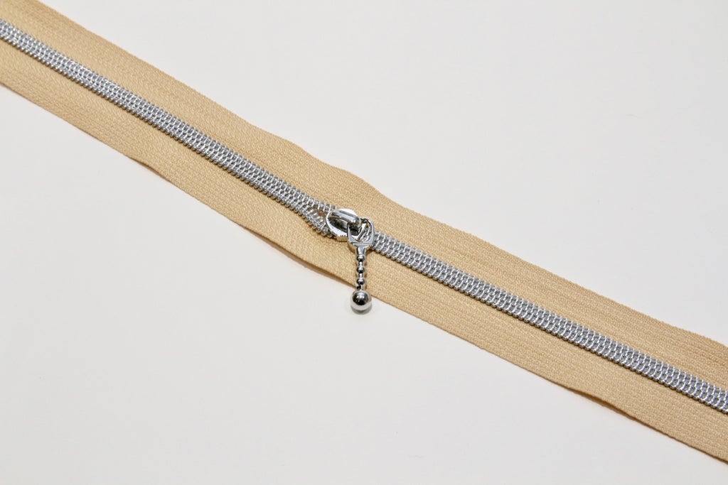 SILVER COIL - CREAM - #5 Metallic Nylon Coil Zipper tape