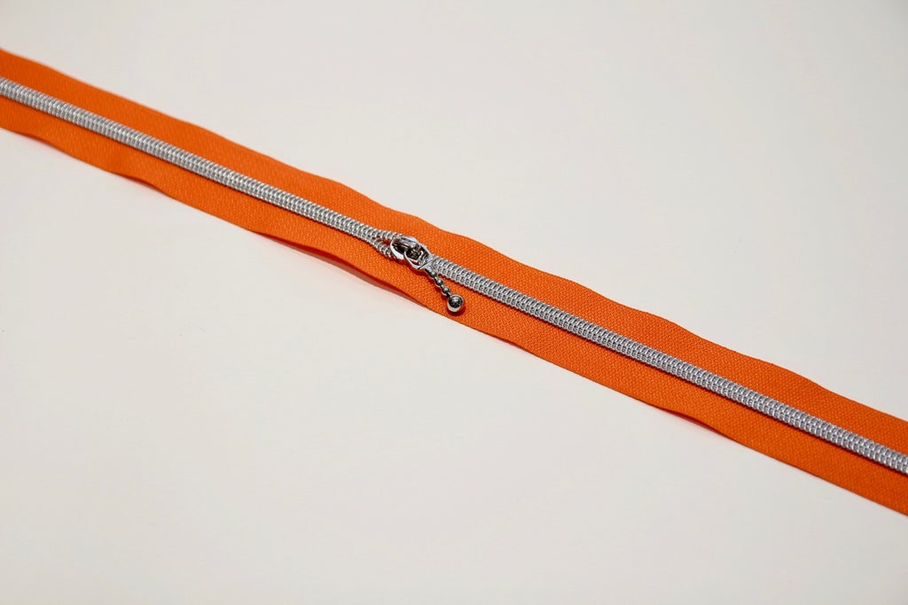 SILVER COIL - ORANGE - #5 Metallic Nylon Coil Zipper tape