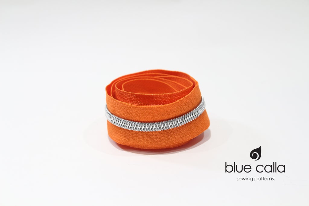 SILVER COIL - ORANGE - #5 Metallic Nylon Coil Zipper tape