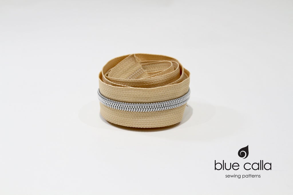 SILVER COIL - CREAM - #5 Metallic Nylon Coil Zipper tape