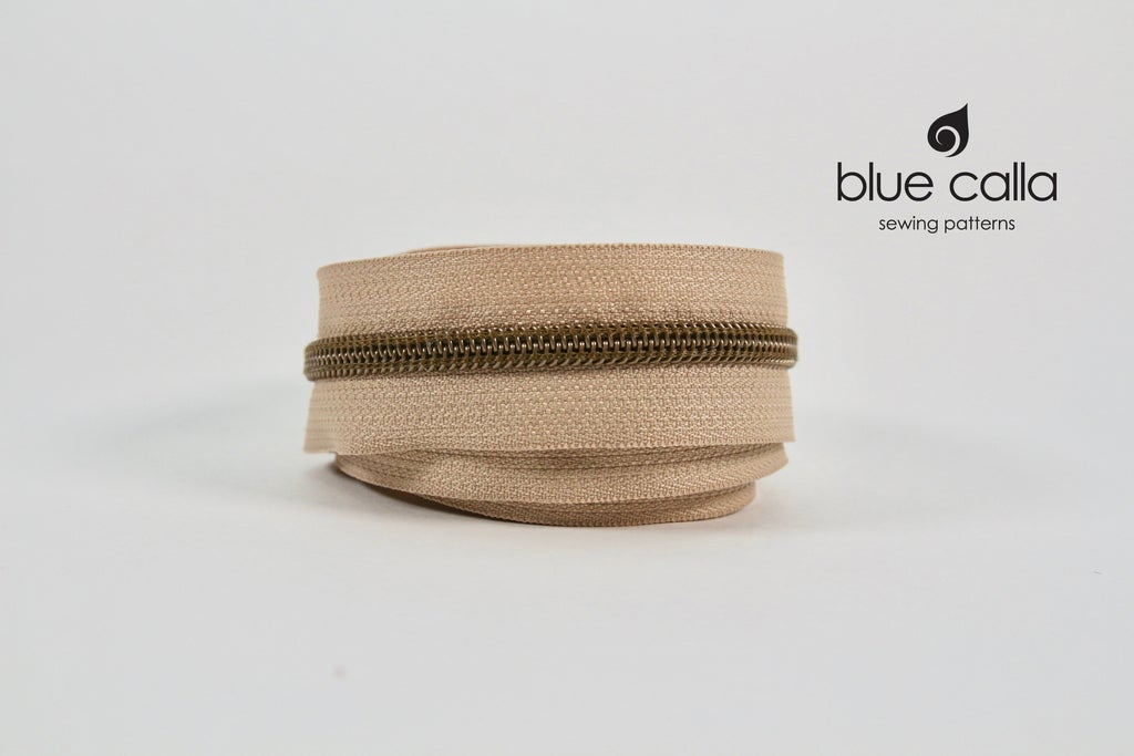 ANTIQUE BRASS COIL - BEIGE - #5 Metallic Nylon Coil Zipper tape