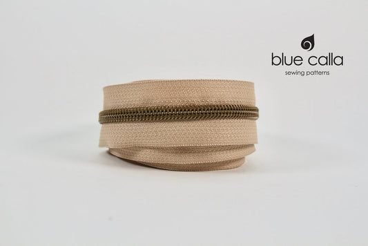 ANTIQUE BRASS COIL - BEIGE - #5 Metallic Nylon Coil Zipper tape