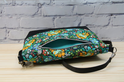Freesia Foldover Bag in Anna Maria Floral on black with black cork