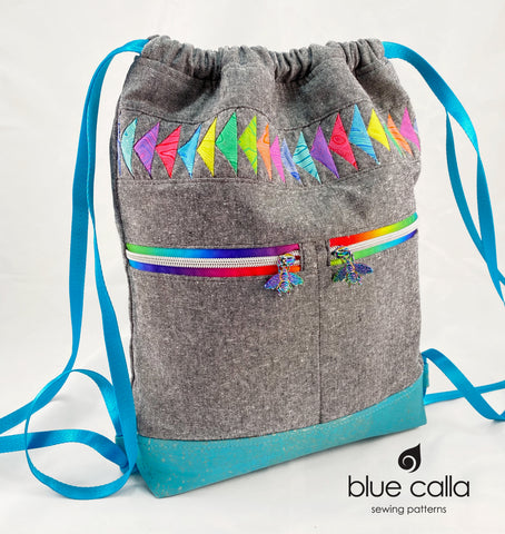 Begonia Backpack in Rainbow Flying Geese on Charcoal Essex with Aqua cork
