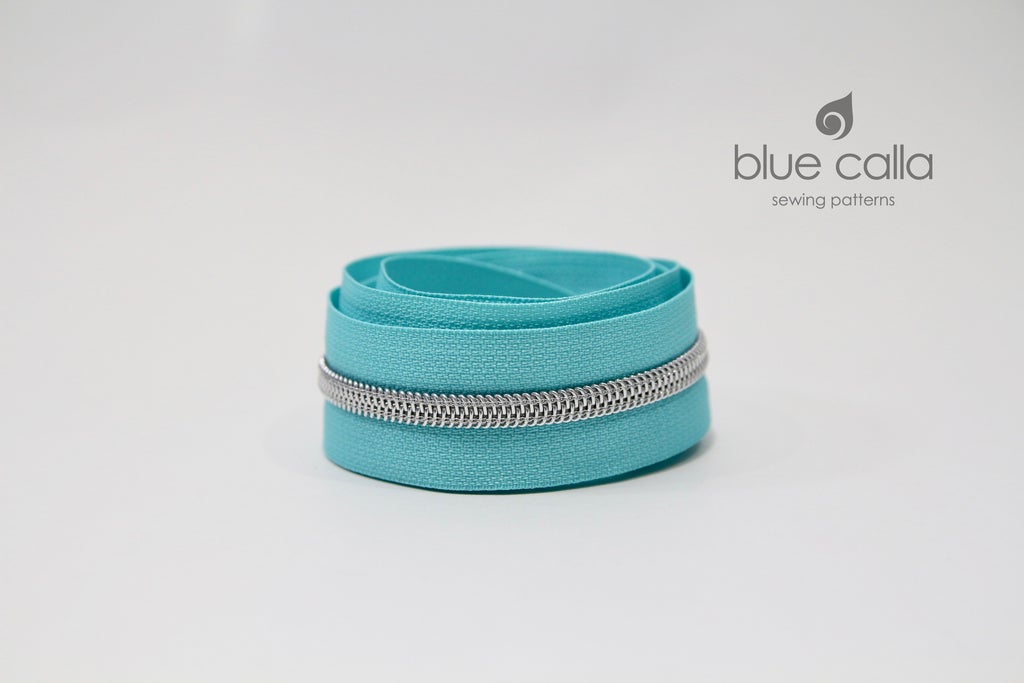 SILVER COIL - AQUA - #5 Metallic Nylon Coil Zipper tape