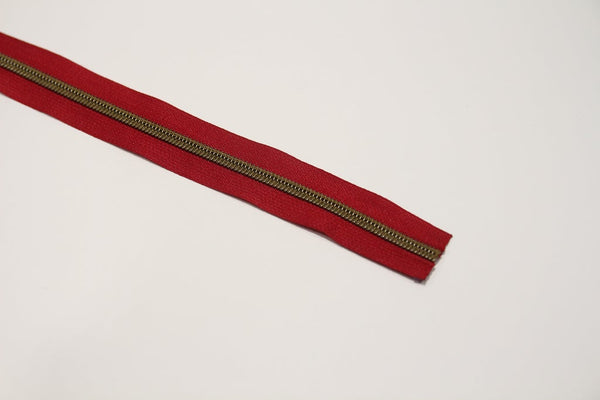 ANTIQUE BRASS COIL - RED - #5 Metallic Nylon Coil Zipper tape