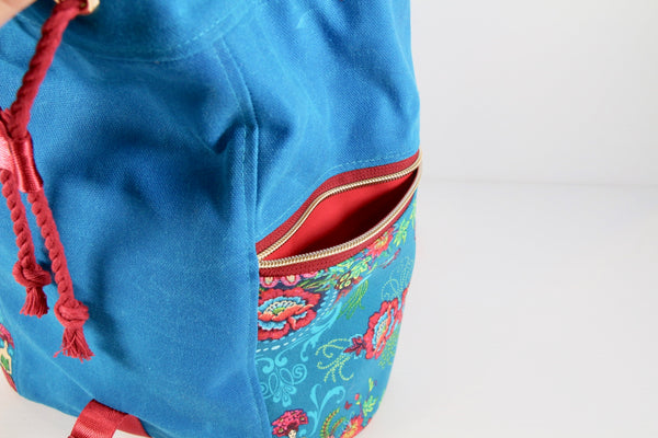 Drawstring Backpack with Bright Blue Waxed Canvas and Mini Flower Fairies