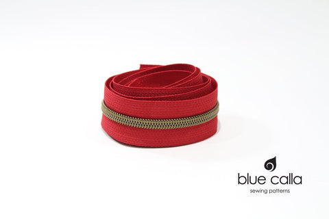ANTIQUE BRASS COIL - RED - #5 Metallic Nylon Coil Zipper tape