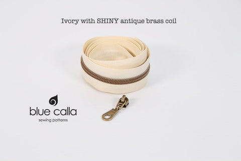 ANTIQUE BRASS COIL - IVORY - #5 Metallic Nylon Coil Zipper tape